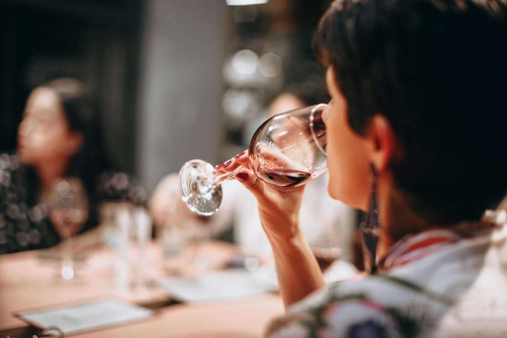 A woman drinking wine